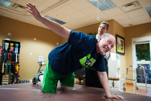 Jim Horrocks does Parkinson's Wellness Recovery exercises with help from physical therapist Christine Montes at Life Care Center of Elkhorn.