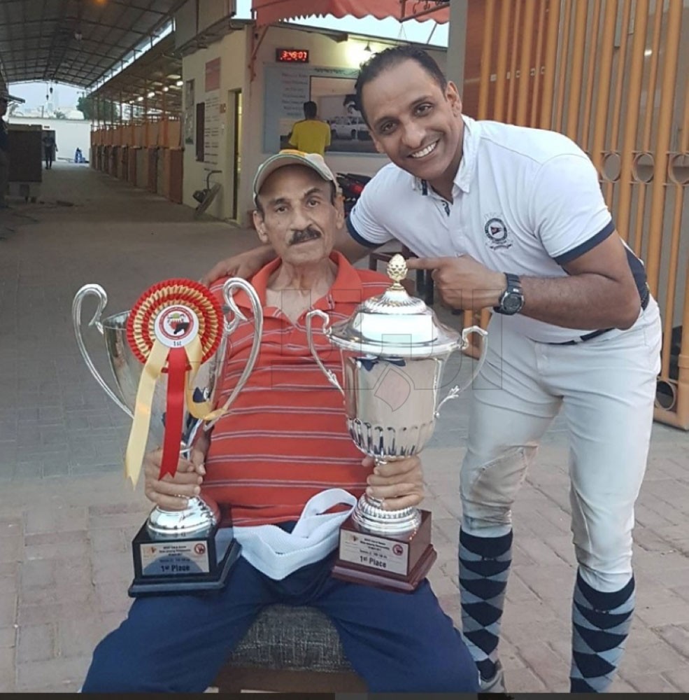 مع ابنه الكابتن سامي