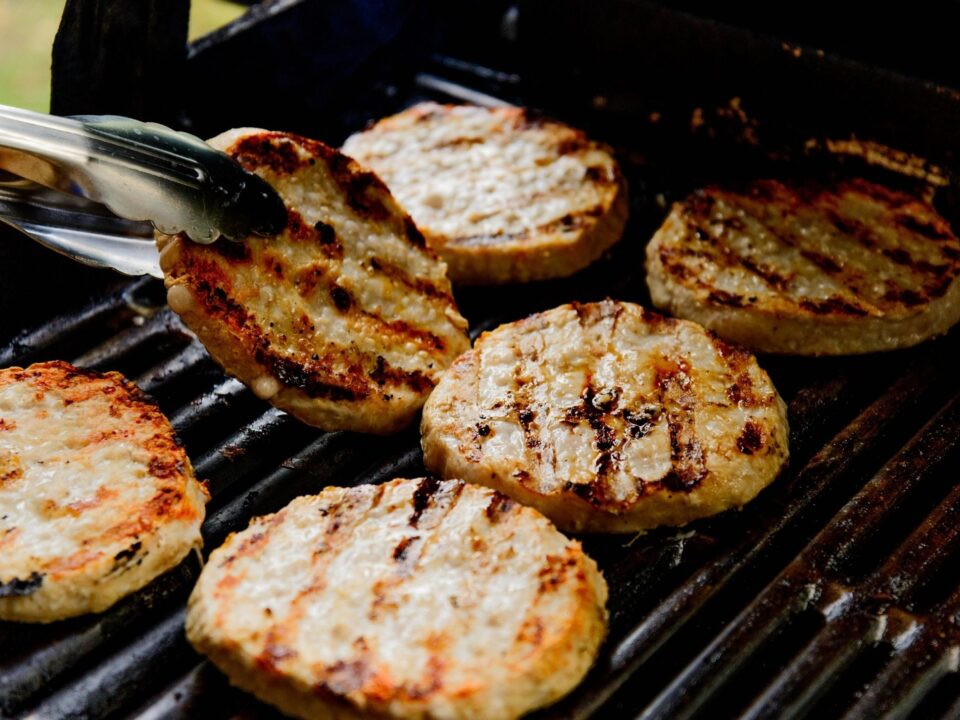 Turkey burgers on grill jpg