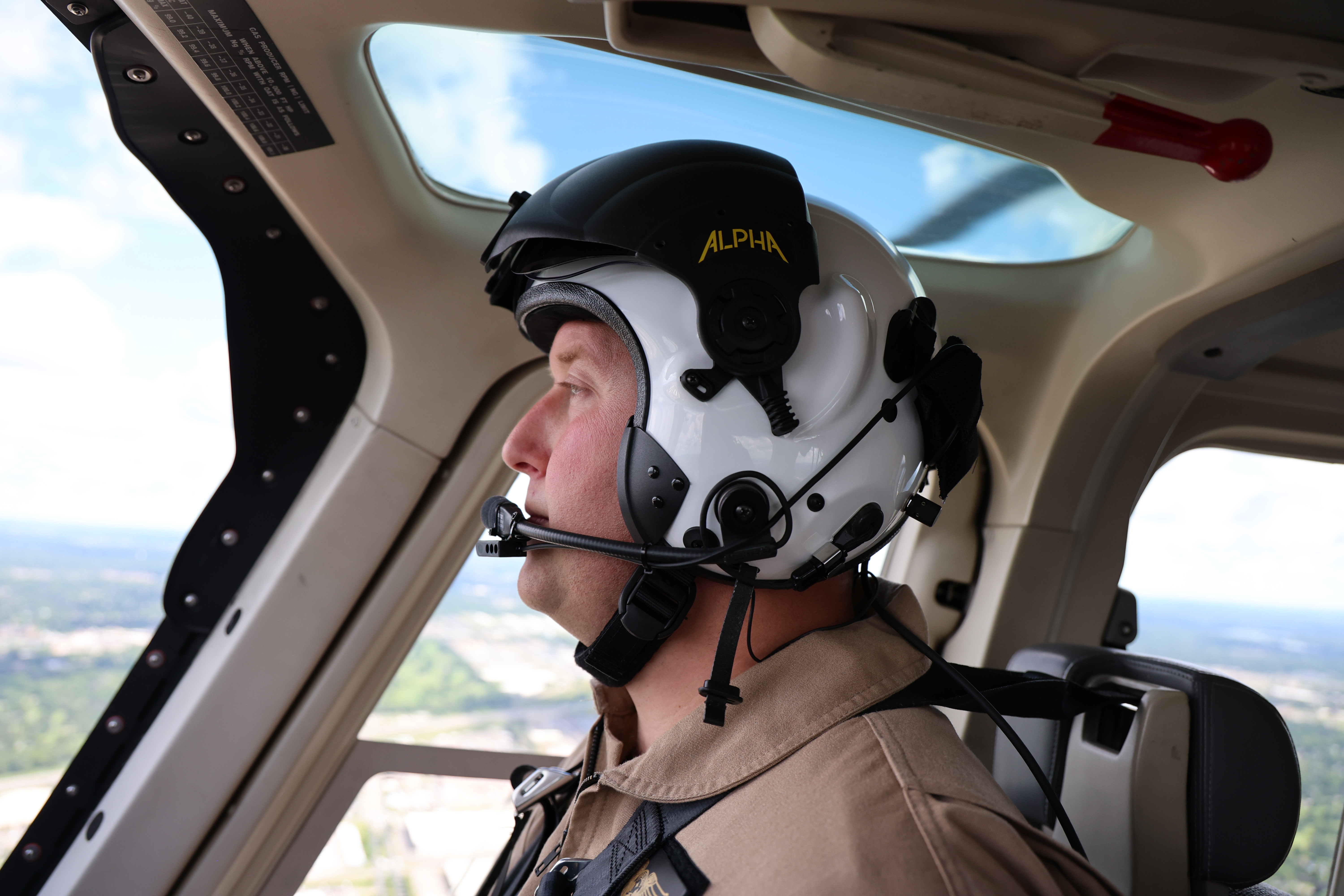 Brett Stricker piloting a State Patrol helicopter