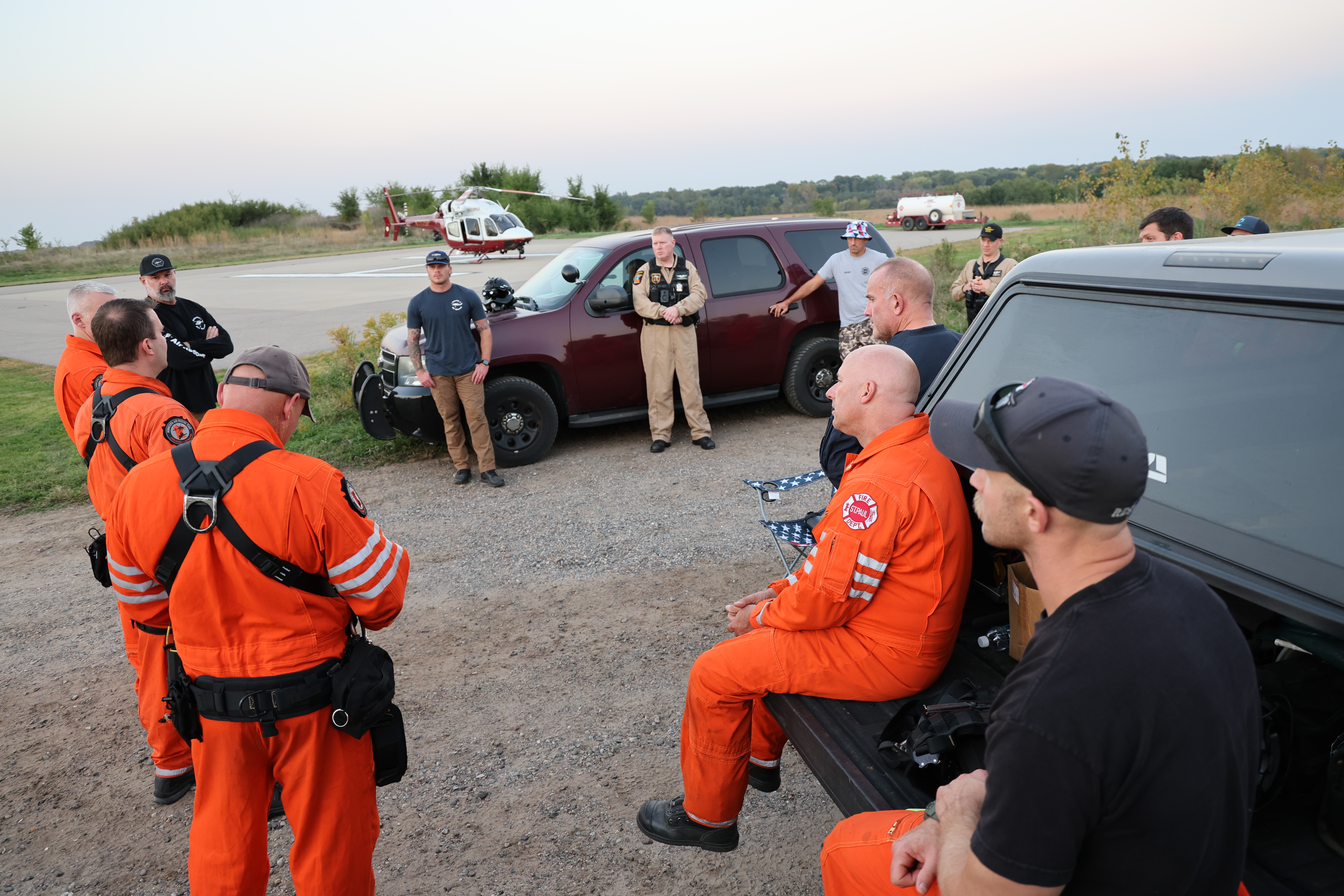The Minnesota Air Rescue Team holds a briefing before conducting their night rescue training