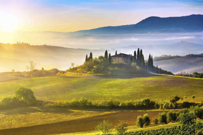 Sunrise over a hill in Tuscany