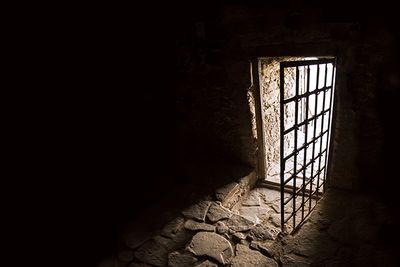 A picture of an open jail door