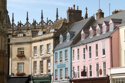 An image of the coloured houses in Cirencester, Cotswolds