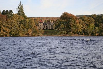 A picture of Aldourie Castle, take from Loch Ness