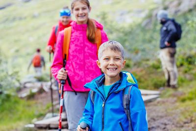 siblings hiking
