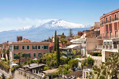 sicilian village and volcano