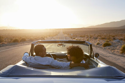 Couple in Car During Sunset