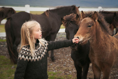 Girl with pony in Iceland