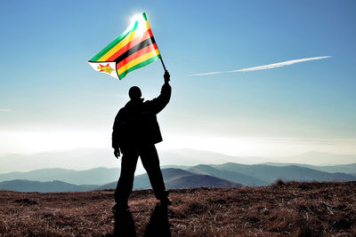 flying zimbabwe flag