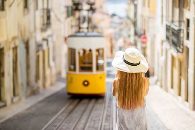woman lisbon tram