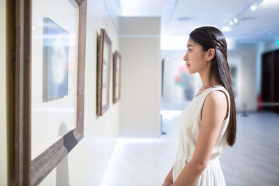 Woman in art gallery
