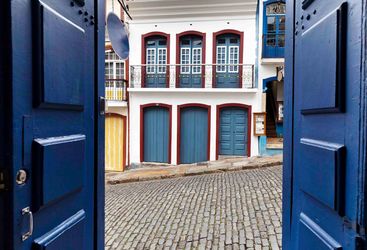 Blue Doorway to Cobbled Street