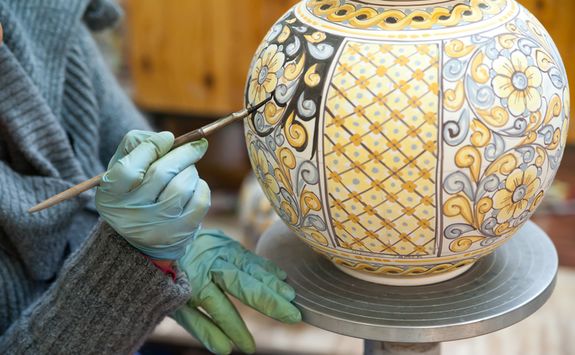 Painting a ceramic vase