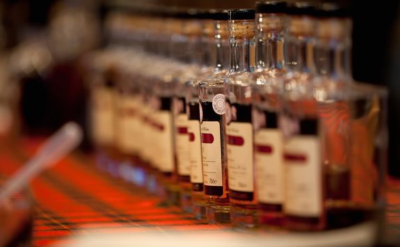 Whisky bottles on a tartan cloth