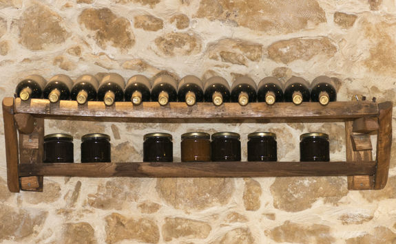 Bottles of wine on a shelf in Crete