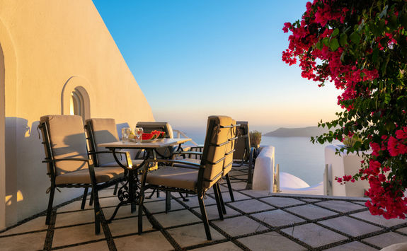 Dinner setup on a patio in Santorini