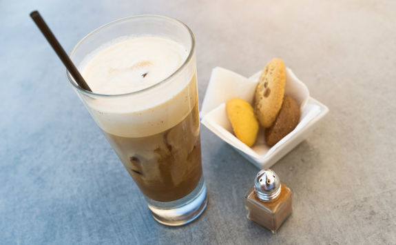 Glass of frappe, a greek iced coffee