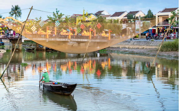 Fisherman on Thu Bon river in Hoi An