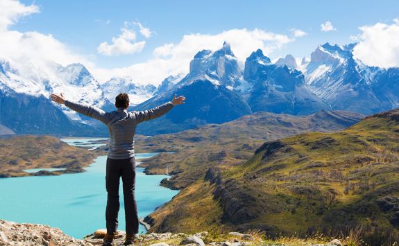 man hiking mountain with view