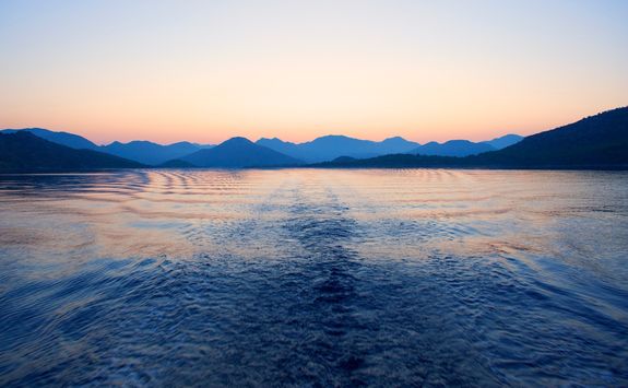 sunset view behing the boat