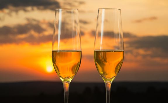 two champagne cup and sunset