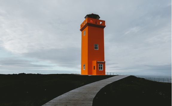 Picturesque remote orange lighthouse