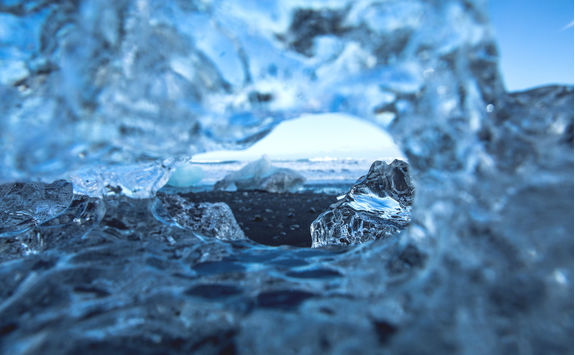 Blue icebergs floating in the lagoon