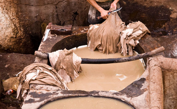 man working in tannery