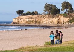 children exploring santa barbara beach