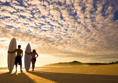 Couple with surfboards
