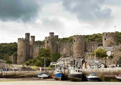 Conwy Castle with harbour in the foreground