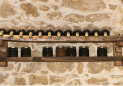 Bottles of wine on a shelf in Crete