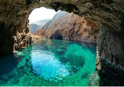 Rocky arch on the shores of Mykonos