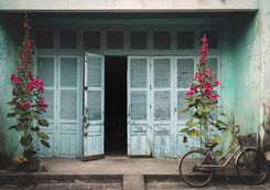 Wooden house with bike in Hoi An