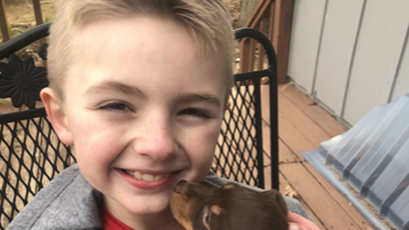 Semmes Murphey Patient Landon and His Puppy