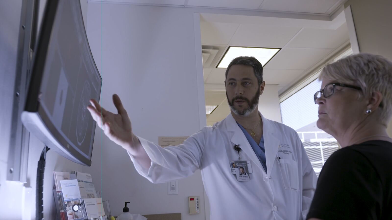Lucas Elijovich pointing a screen square