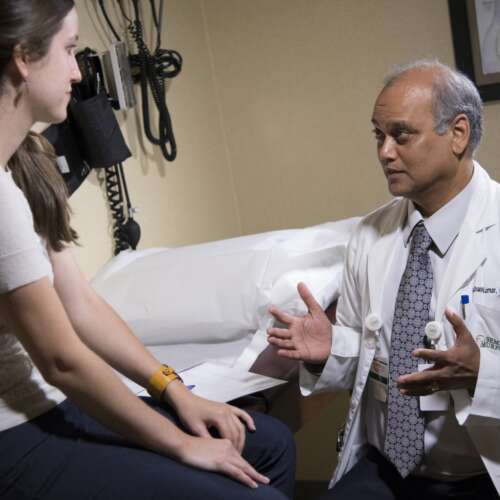 Dr. Kumar at Semmes Murphey Explaining to a Patient