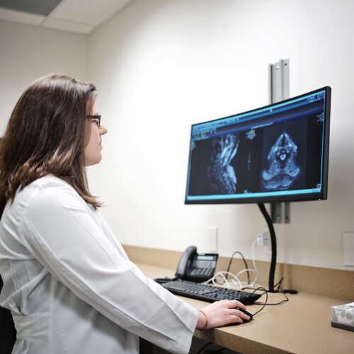 Physiatrist Amber Graham Looking at Imaging at Semmes Murphey Clinic