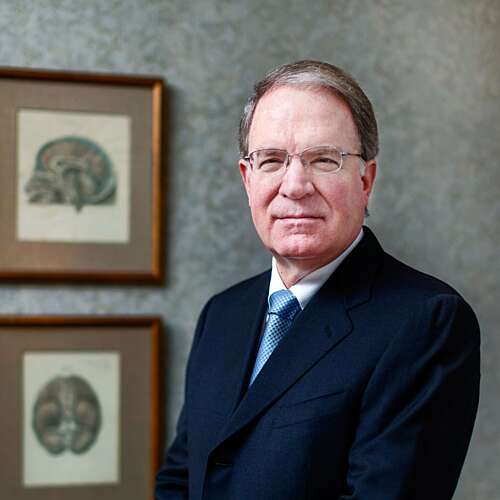 A boardroom portrait of Dr. Kevin Foley