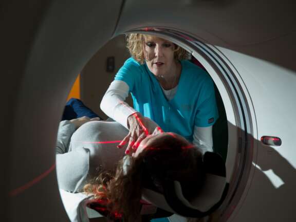 Nurse and patient from inside a CT machine