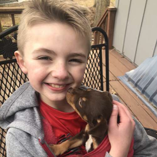 Semmes Murphey Patient Landon and His Puppy
