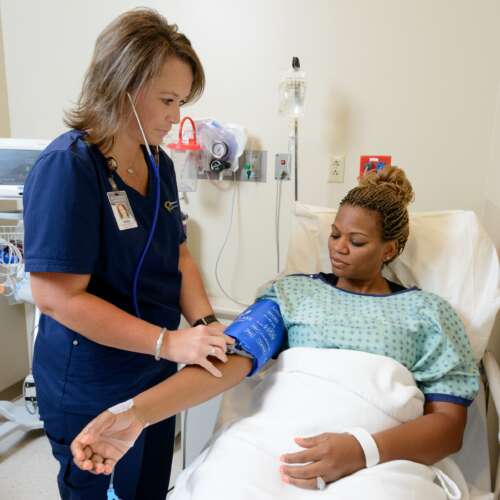 Nurse Treating a Patient
