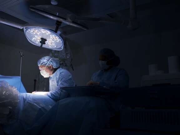 Dr. Foley in Surgery Room with Dramatic Lights at a spinal clinic