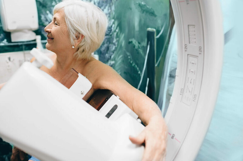 Senior woman having a mammogram scan at the diagnostic imaging center