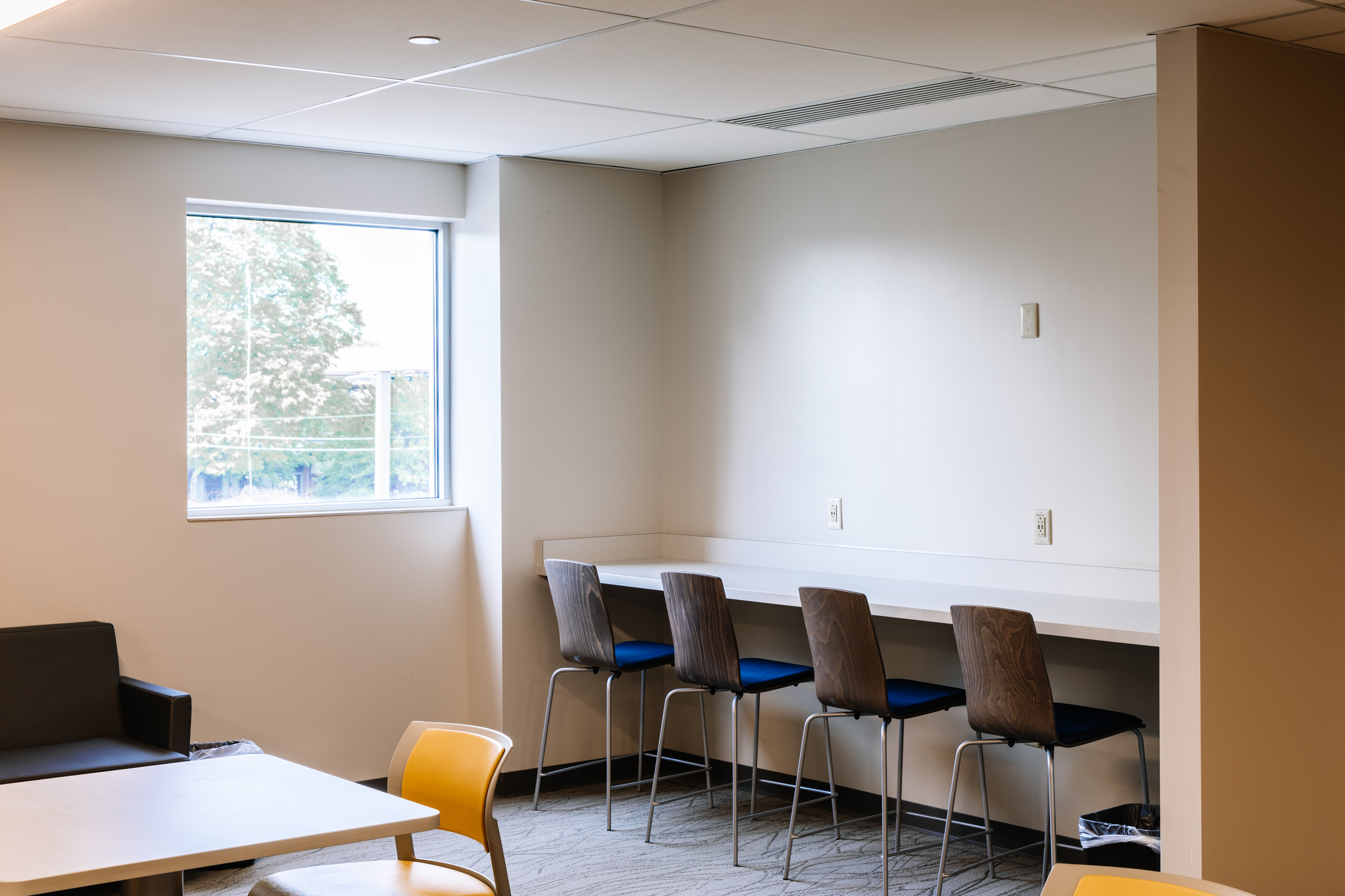 Along with traditional waiting room seating, the ASC waiting area also offers plenty of space to work and plug in your devices.