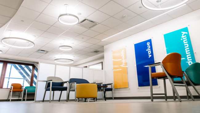 The waiting area offers comfortable seating in a bright, clean and modern space.