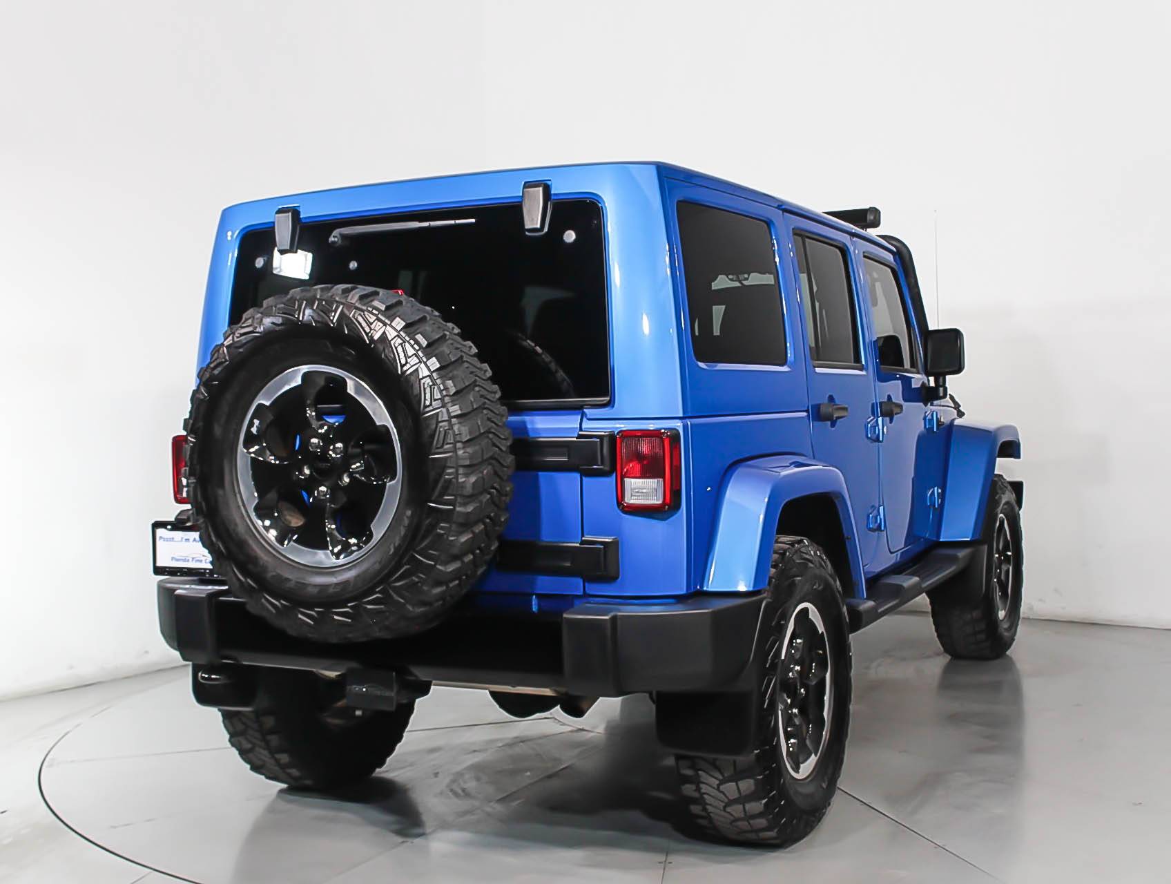 Florida Fine Cars - Used JEEP WRANGLER UNLIMITED 2014 MIAMI Sahara Polar Edition