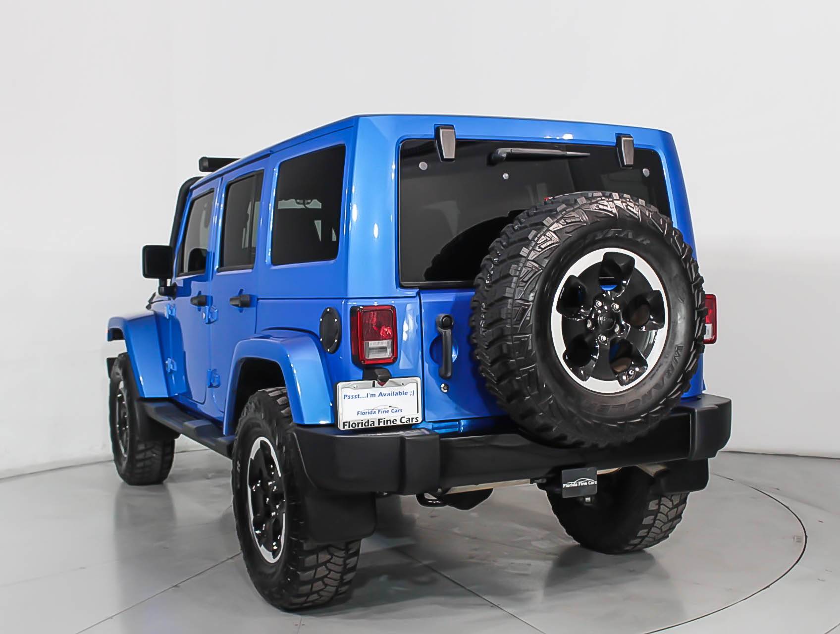 Florida Fine Cars - Used JEEP WRANGLER UNLIMITED 2014 MIAMI Sahara Polar Edition