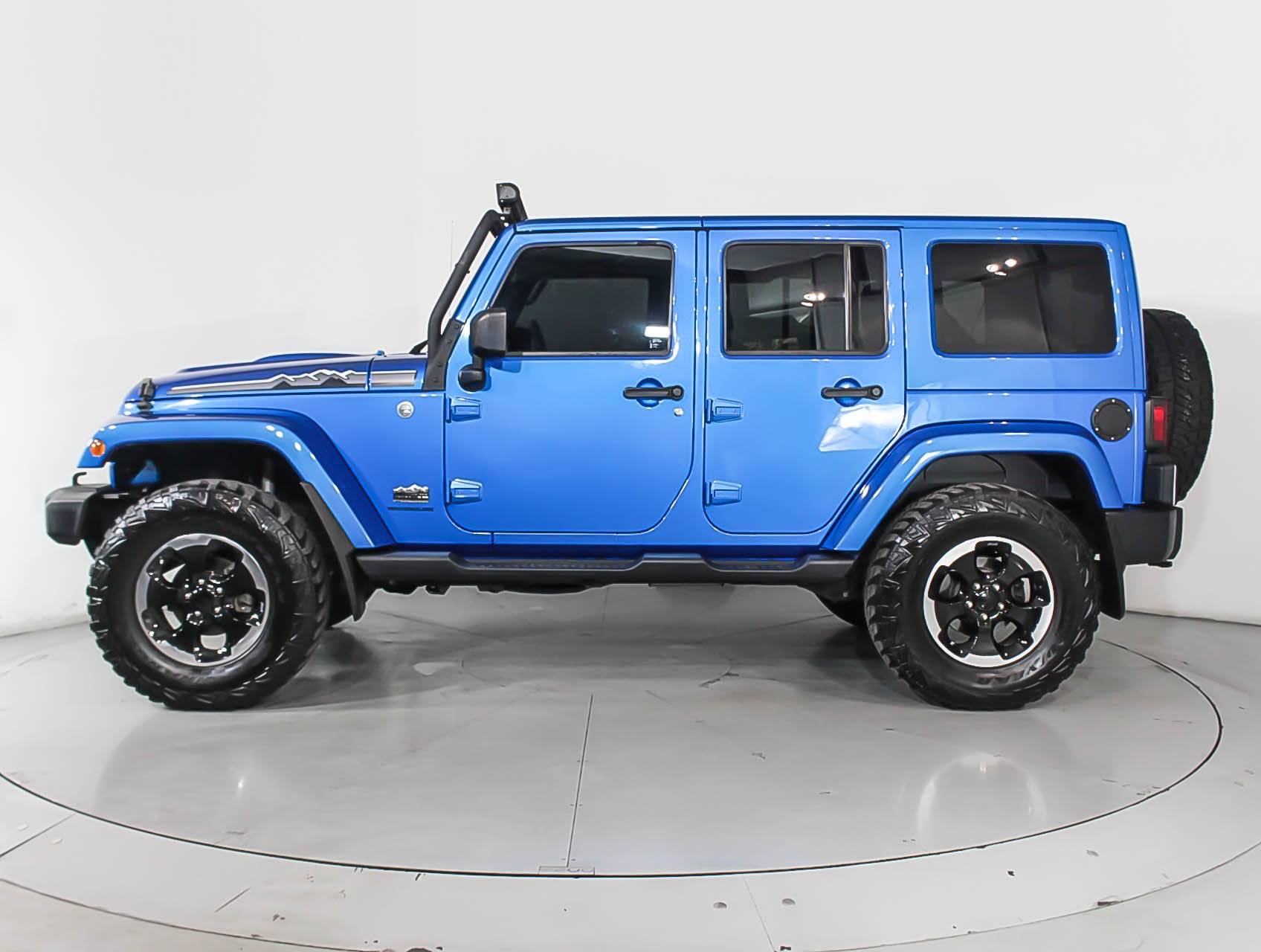 Florida Fine Cars - Used JEEP WRANGLER UNLIMITED 2014 MIAMI Sahara Polar Edition
